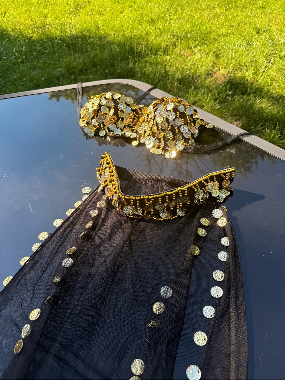 Two piece black and gold Egyptian belly dance set